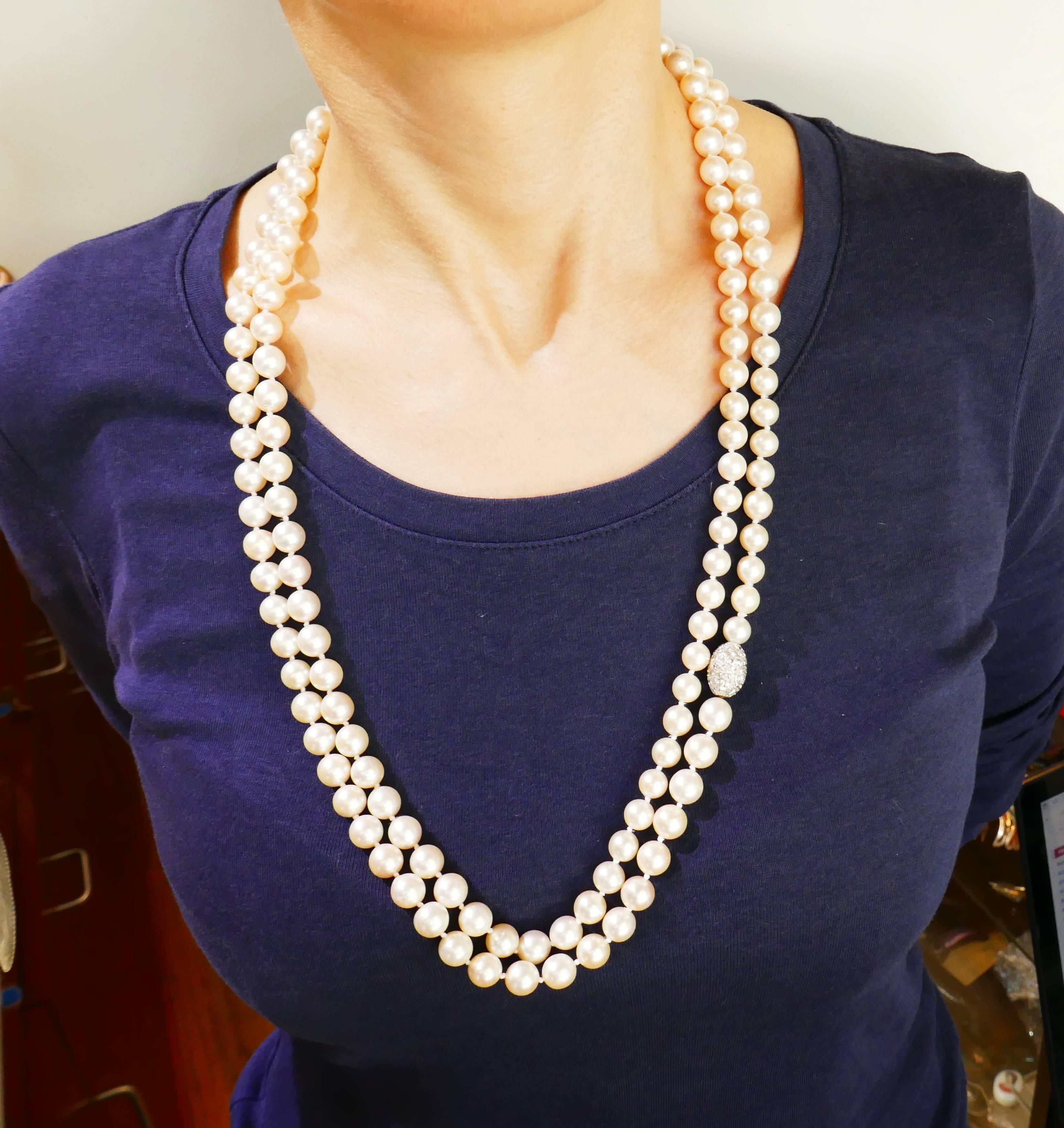 Beautiful, classy and timeless long strand necklace with a diamond clasp. Versatile and wearable, the necklace is a great addition to your jewelry collection. 
The pearls have creamy overtone, measure in average 9.5 mm in diameter, have excellent