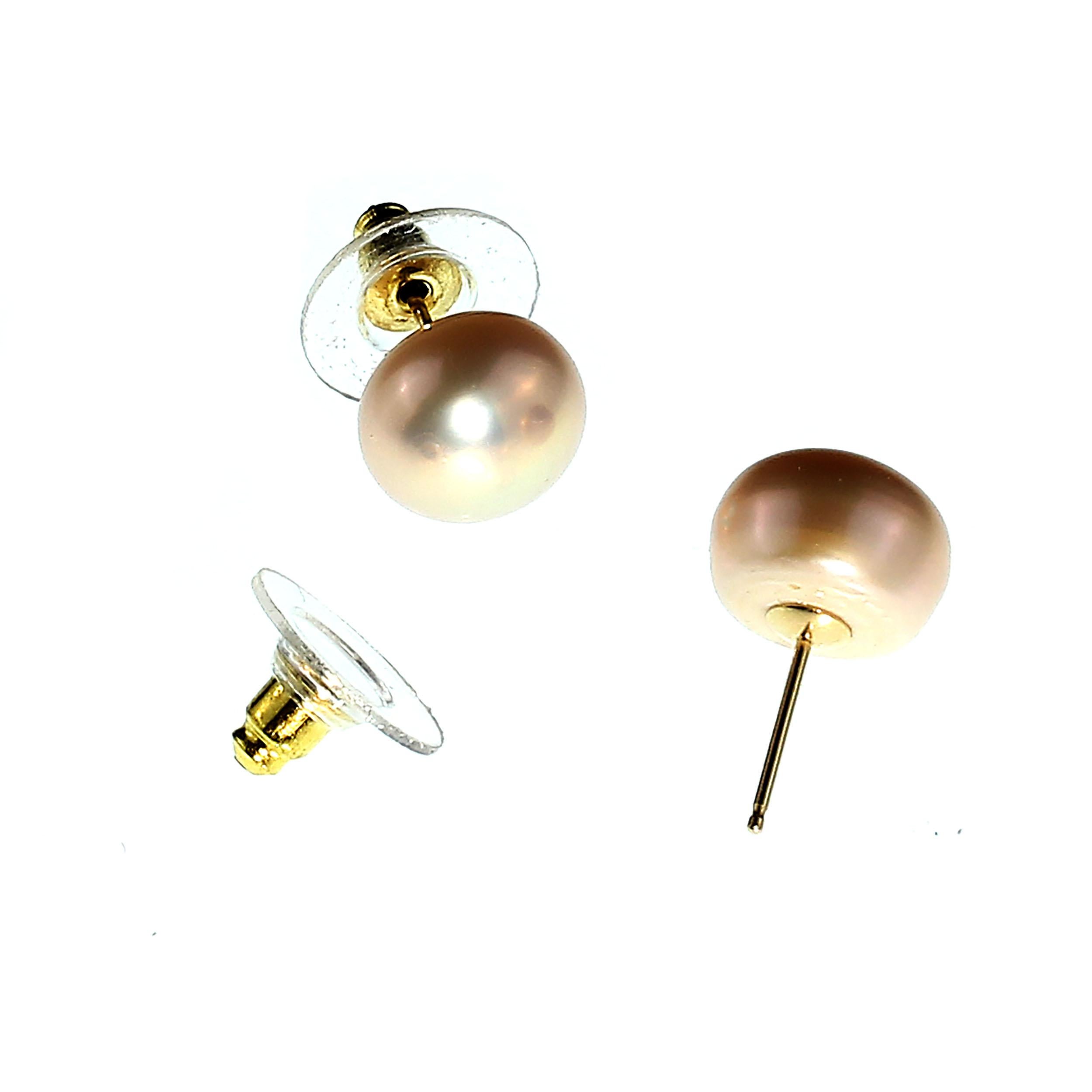 These pearl stud earrings are perfect for when you're teleconferencing! And they are available for immediate shipment.
Your classic jewelry must have, lustrous, glowing 11MM Pearl Studs. These gorgeous studs are a pinky/mauve with 14K yellow gold