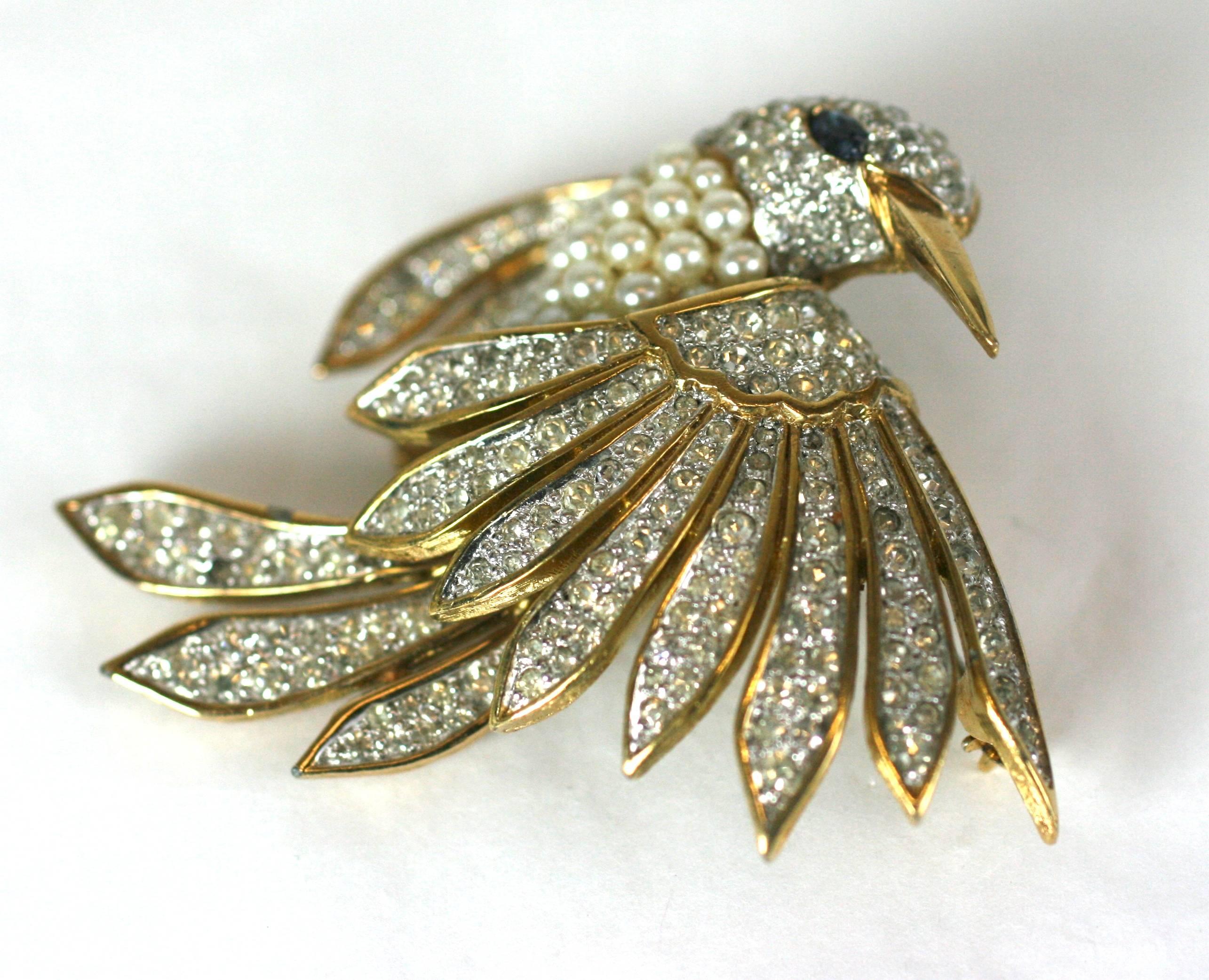 Pearl Studded Jomaz Bird with pave crystal set wings. Dimensional bird in flight with faux sapphire marquise eye. Jomaz is the later incarnation of the Joseph Mazer company which produced some of the highest quality faux jewels thoughout the 20th