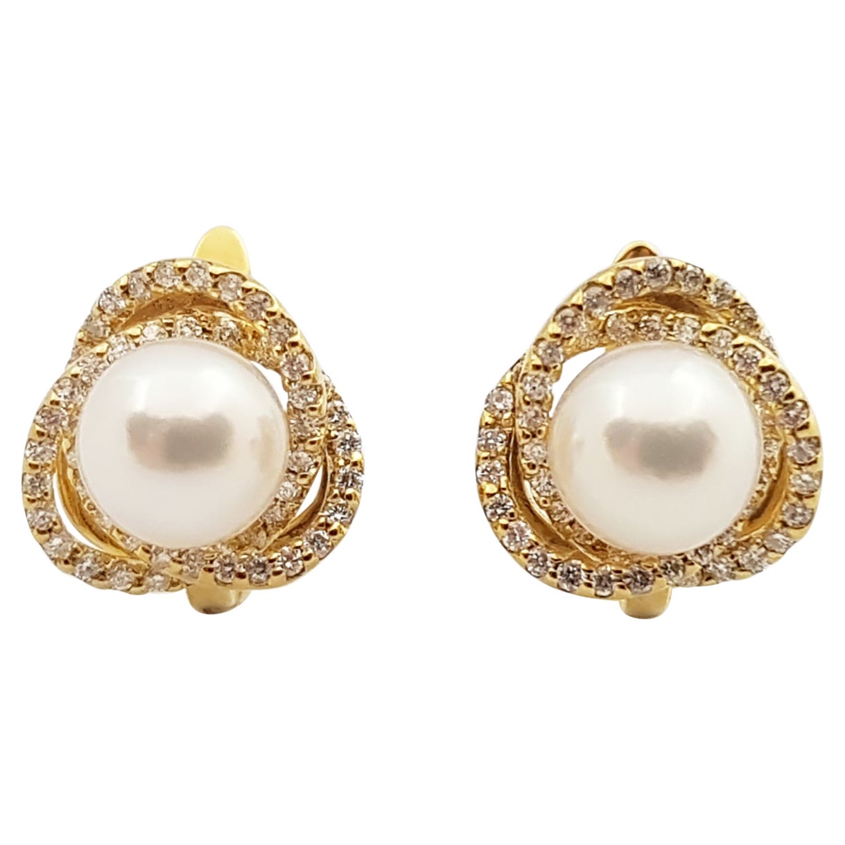 Boucles d'oreilles en or 18 carats serties de perles et de diamants