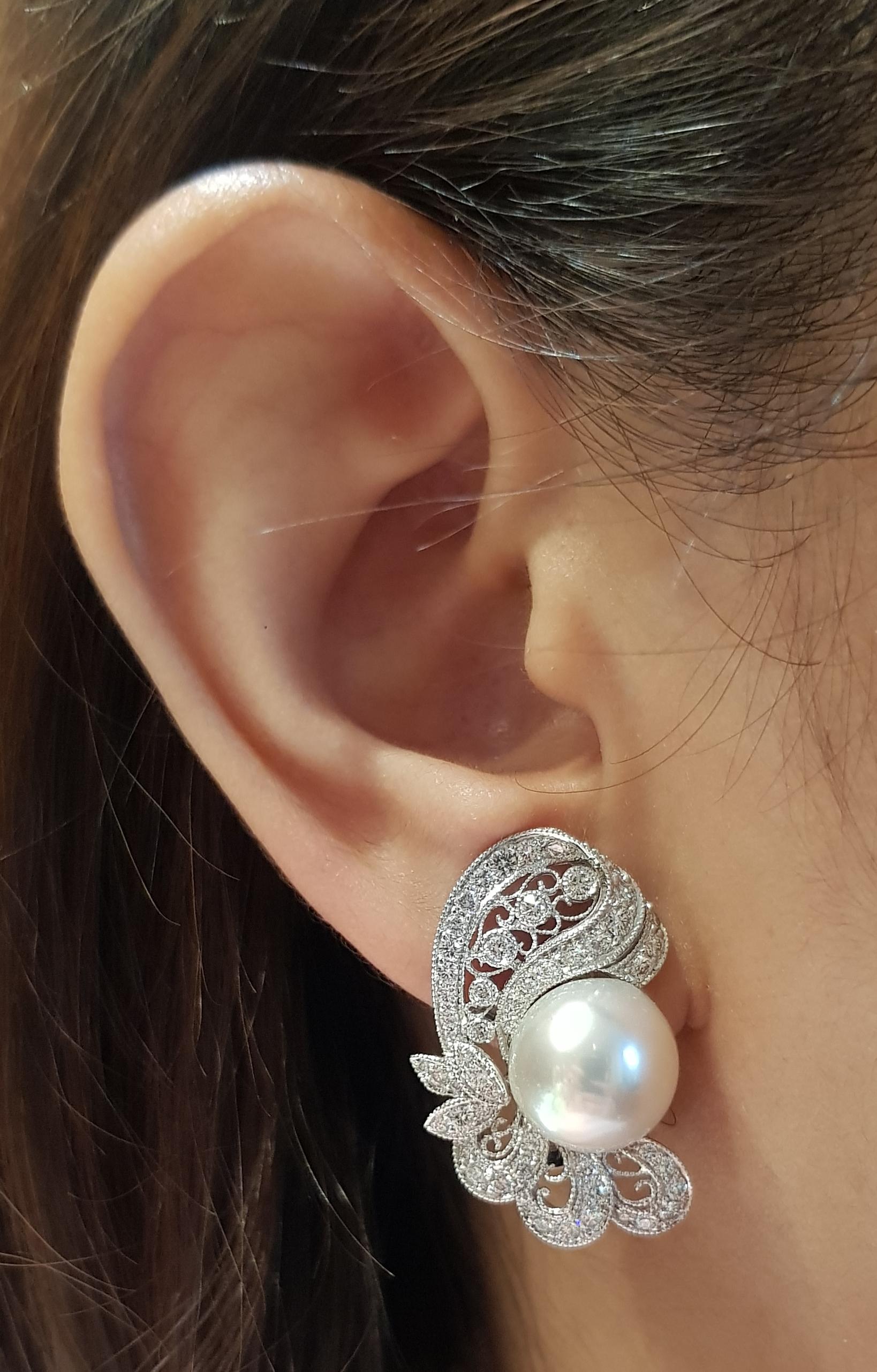 Pearl with Diamond 1.51 carats Earrings set in 18 Karat White Gold Settings

Width:  1.8 cm 
Length:  2.9 cm
Total Weight: 15.13 grams

