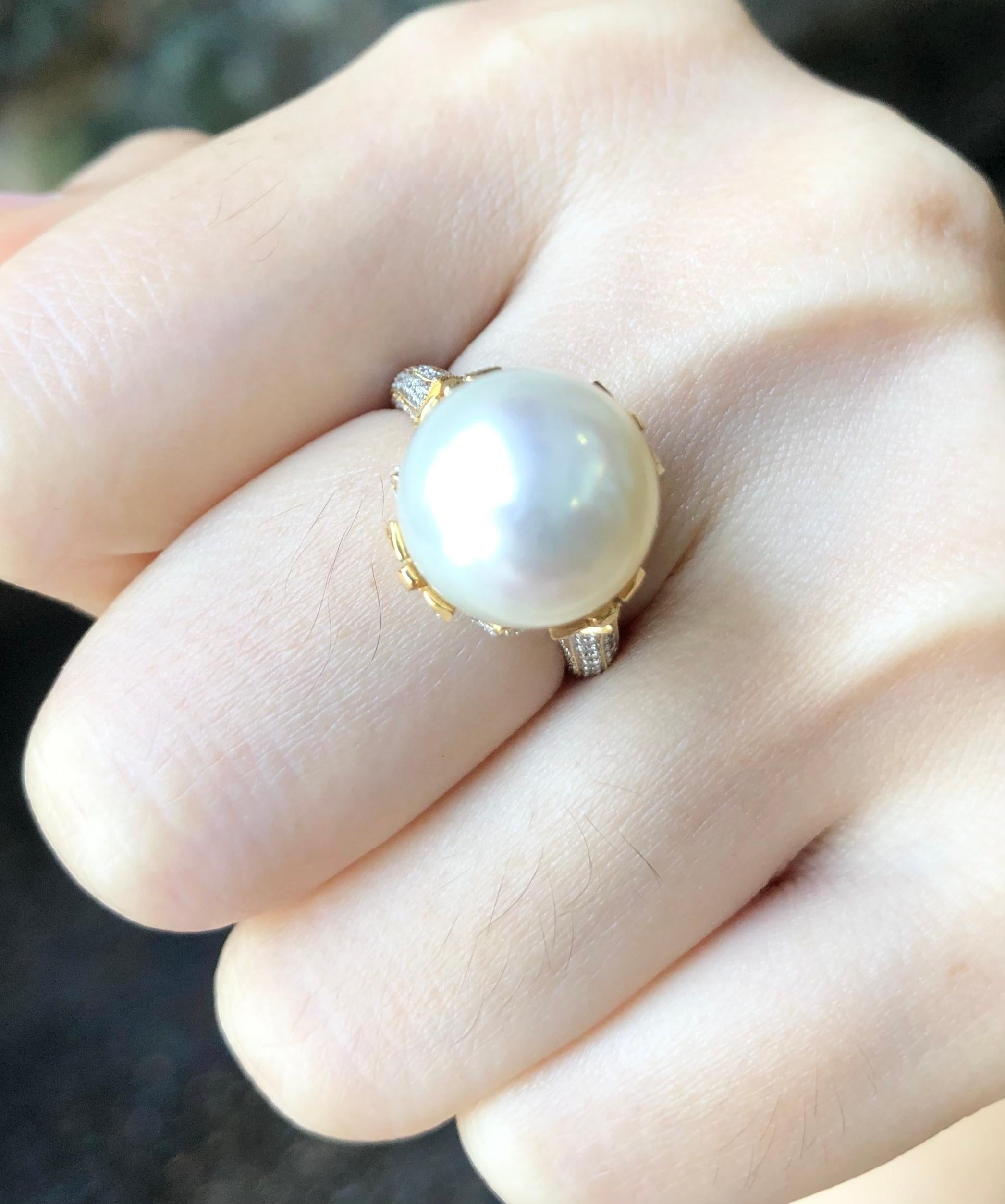 Pearl with Diamond 0.80 carat  Ring set in 18 Karat Gold Settings

Width:  1.3 cm 
Length: 1.3 cm
Ring Size: 51
Total Weight: 8.83 grams

Pearl: 11.8 mm

