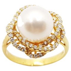 Pearl with Diamond Ring Set in 18 Karat Gold Settings
