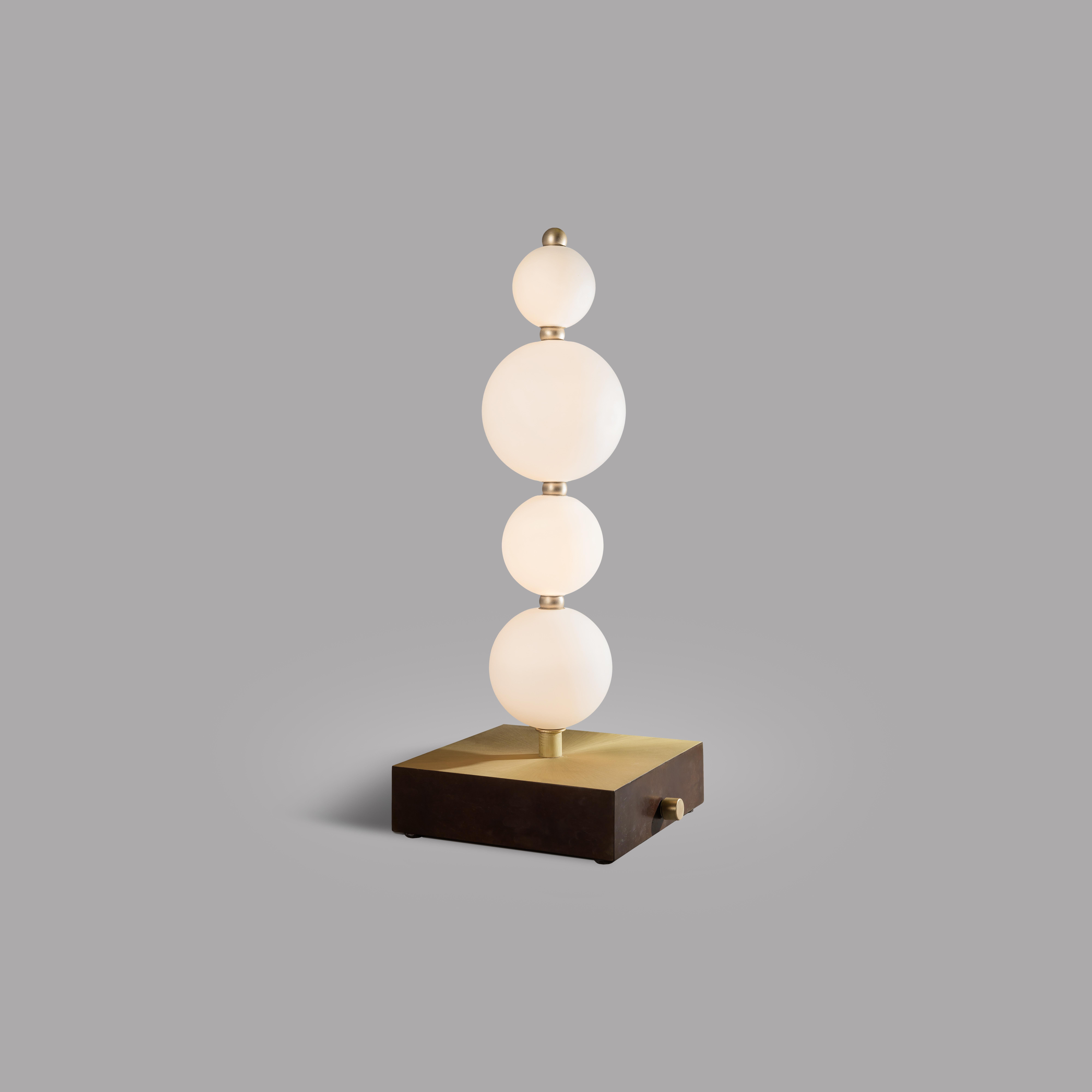 Pearl XY table lamp by Ludovic Clément d’Armont
Dimensions: D 23 x W 23 x H 58 cm
Materials: Blown glass, brass.

Ludovic Clément d’Armont is in the continuation of a family tradition of centuries of gentle glassmakers, painters, carpenters and