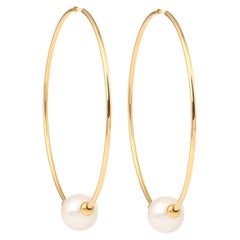 Boucles d'oreilles en or jaune 18 carats avec perles