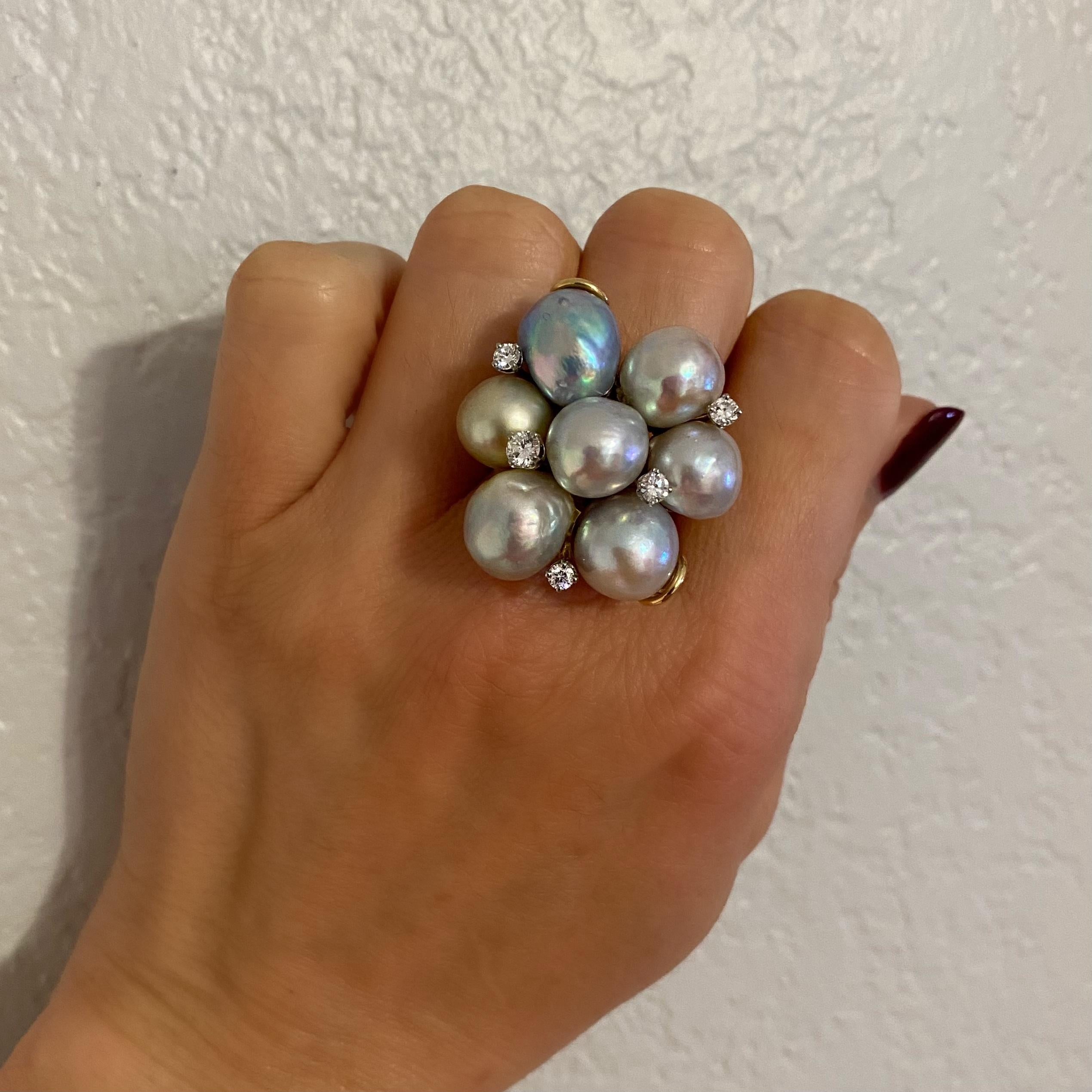 Simply Beautiful, Elegant and finely detailed Cocktail Cluster Ring, set with 7 freshwater Pearls, each measuring approx. 10-14mm and 5 round brilliant-cut Diamonds, approx. total carat weight of Diamonds 0.58 Carats. Measures approx. 1.14”w x