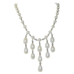 Pearls and Diamonds Necklace in 14 Karat White Gold
