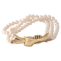 Vintage Pearls Bracelet with an 18 Karat Gold Designer Clasp and 0.30 Carat Diamonds