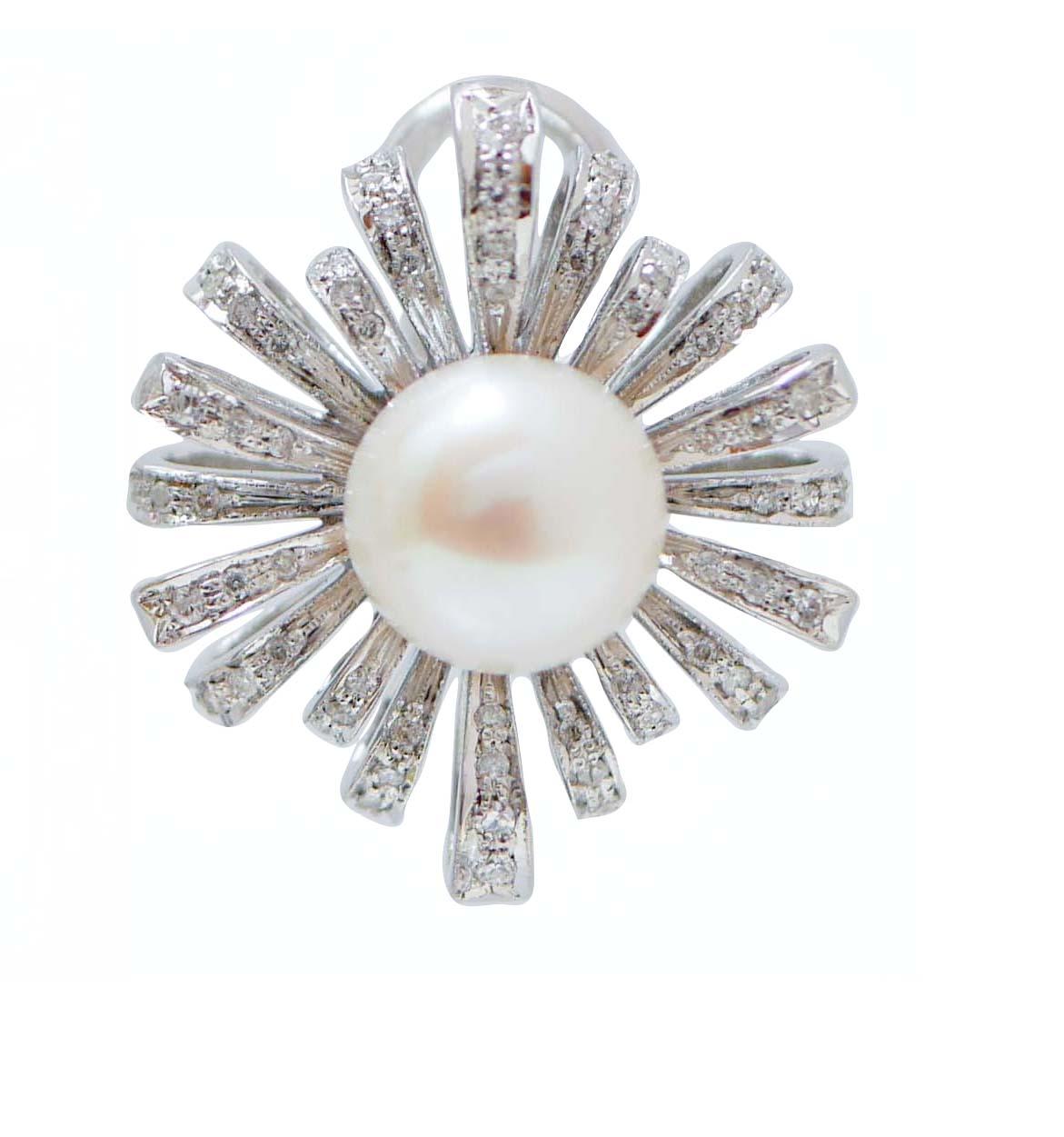 Eleganti orecchini con struttura in oro bianco 14 kt montati con una perla centrale circondata da diamanti.
Questi orecchini sono stati realizzati totalmente a mano da maestri orafi italiani e sono in perfette condizioni.
Diamanti 0.63 ct
Perle 1,80