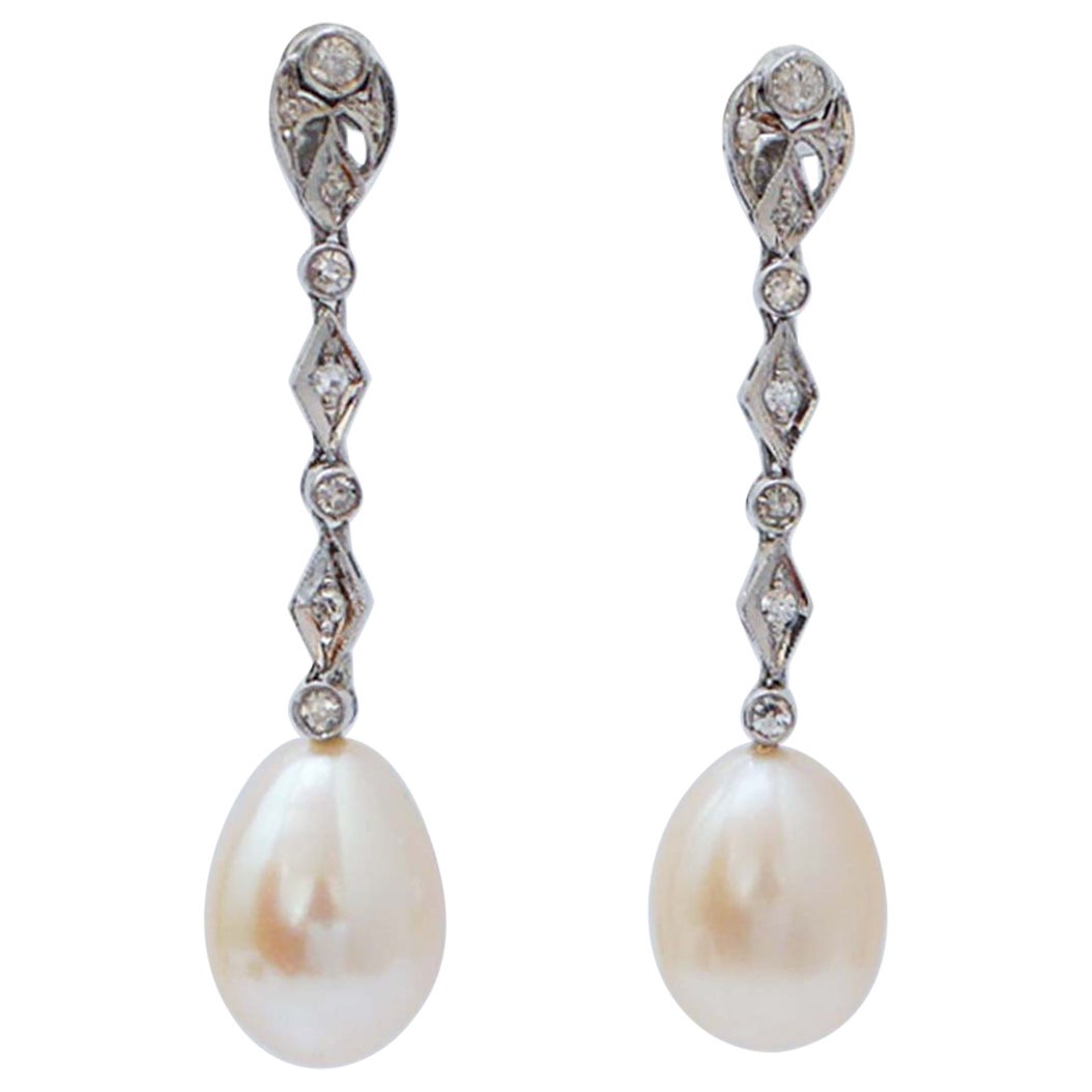 Perle, diamanti, orecchini in oro bianco 14 carati.