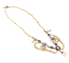 Collier pendentif en or jaune 9 carats perles diamants saphirs