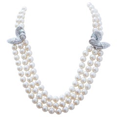 Halskette aus Platin mit Perlen, Diamanten, Saphiren und Platin