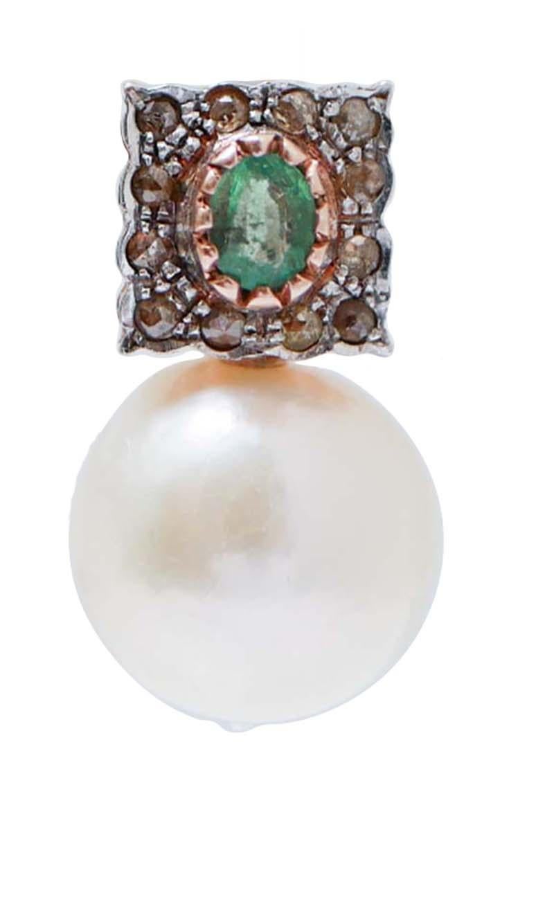 Amazing earrings in 9 kt rose gold and silver structure mounted with an emerald surrounded by a frame of diamonds and, below, a pearl.
Diamonds 0.73 ct
Emeralds 0.97 ct
Pearls 7.70 gr - 14 mm
Total Weight 12.40 gr
RF *GAOA

For any informations,