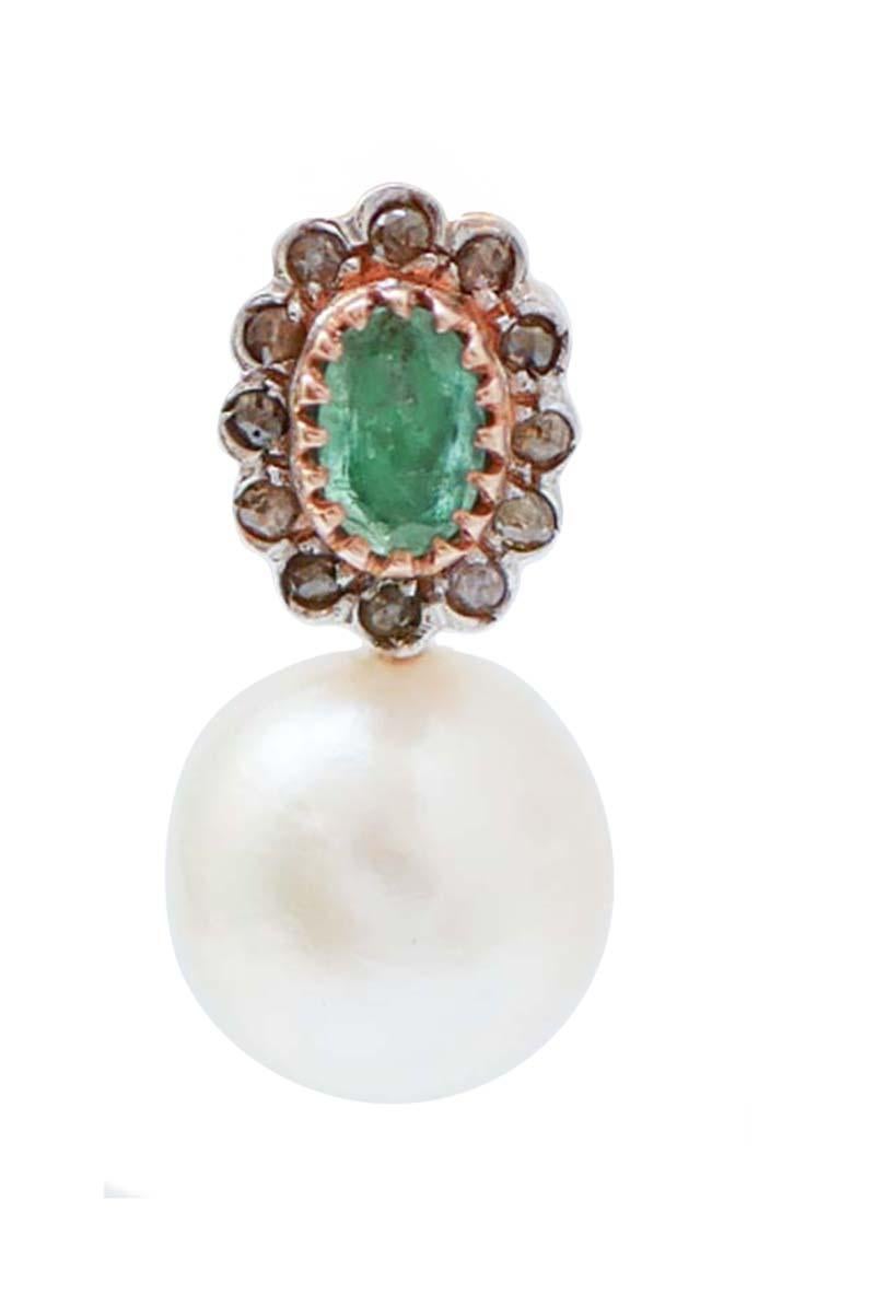 Fantastici orecchini pendenti in oro rosa 9 kt e struttura in argento montata con uno smeraldo in una cornice di diamanti. Come ciondolo, una perla bianca.
Diamanti 0.73 ct
Smeraldi 1,95 ct
Perle 5,70 gr - 12,5 mm
Peso totale 9.70 gr
RF  *ROU


Per