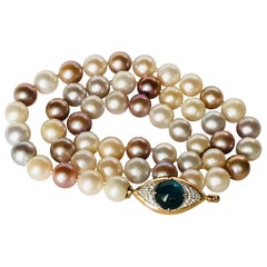 Pearls Necklace with 18 Karat Gold, Diamonds and Kyanite Eye Clasp