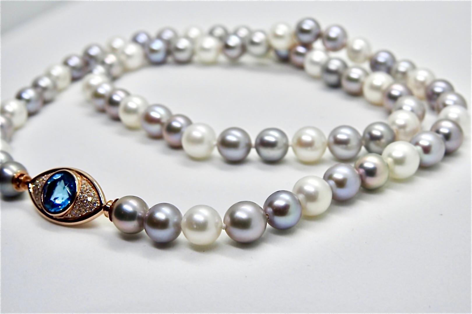 Round Cut Pearls Necklace with 18 Karat Gold, Diamonds and London Blue Topaz Eye Clasp For Sale