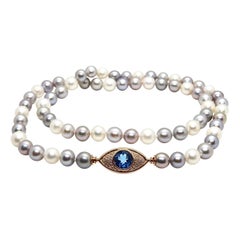 Pearls Necklace with 18 Karat Gold, Diamonds and London Blue Topaz Eye Clasp