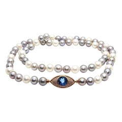 Pearls Necklace with 18 Karat Gold, Diamonds and London Blue Topaz Eye Clasp