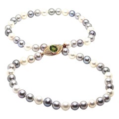 Pearls Necklace with 18 Karat Gold, Diamonds and Peridot Eye Clasp