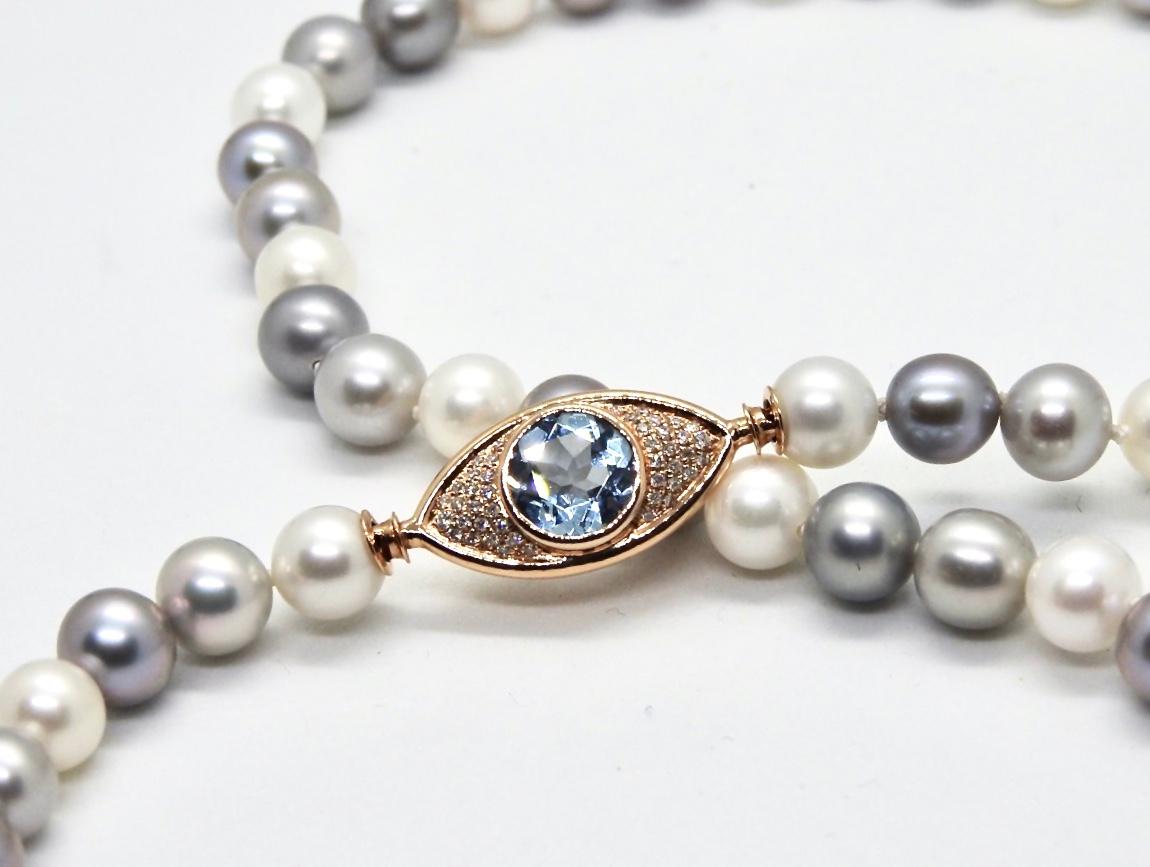 Contemporary Pearls Necklace with 18 Karat Gold, Diamonds and Sky Blue Topaz Eye Clasp For Sale