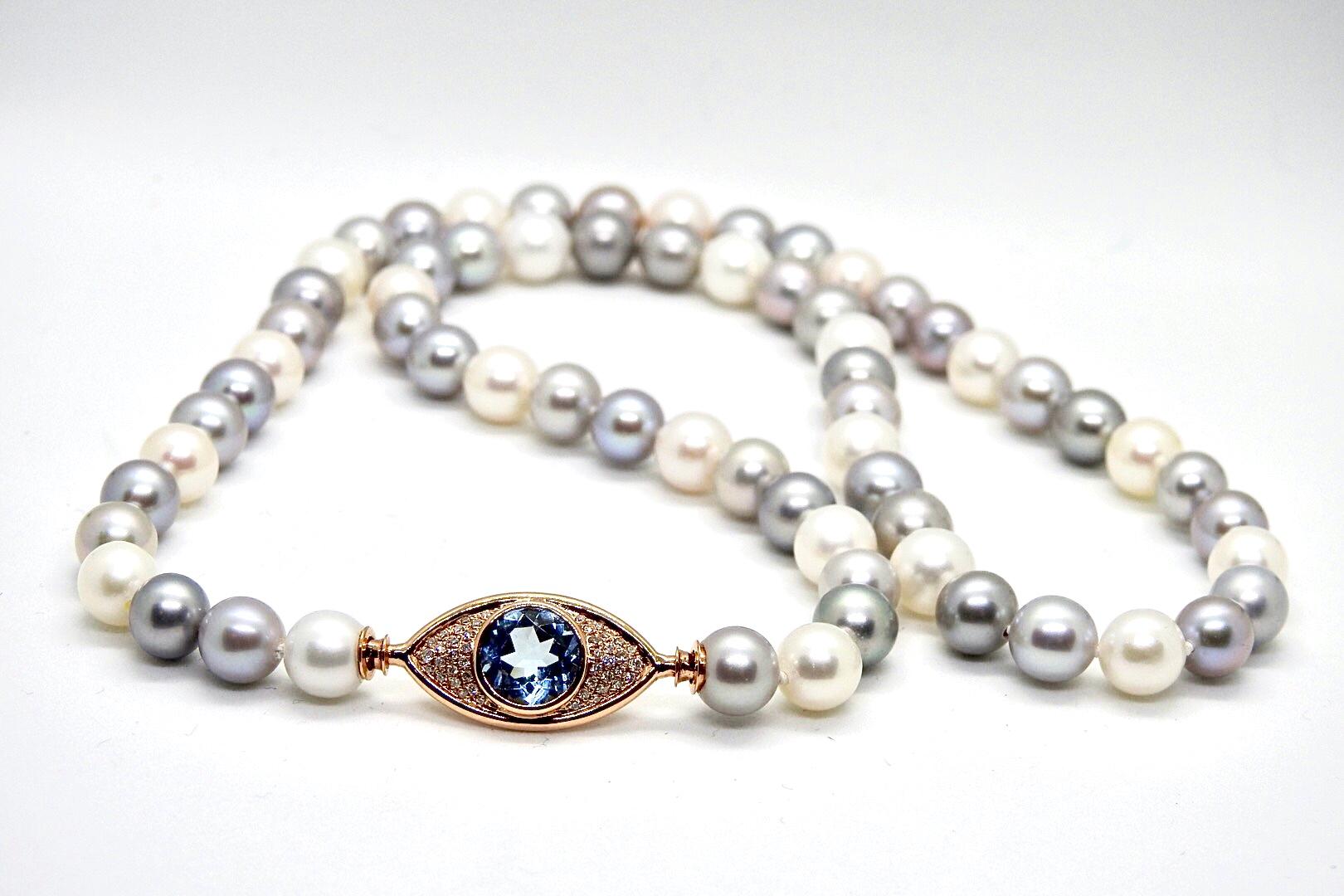 Contemporary Pearls Necklace with 18 Karat Gold, Diamonds and Swiss Blue Topaz Eye Clasp For Sale