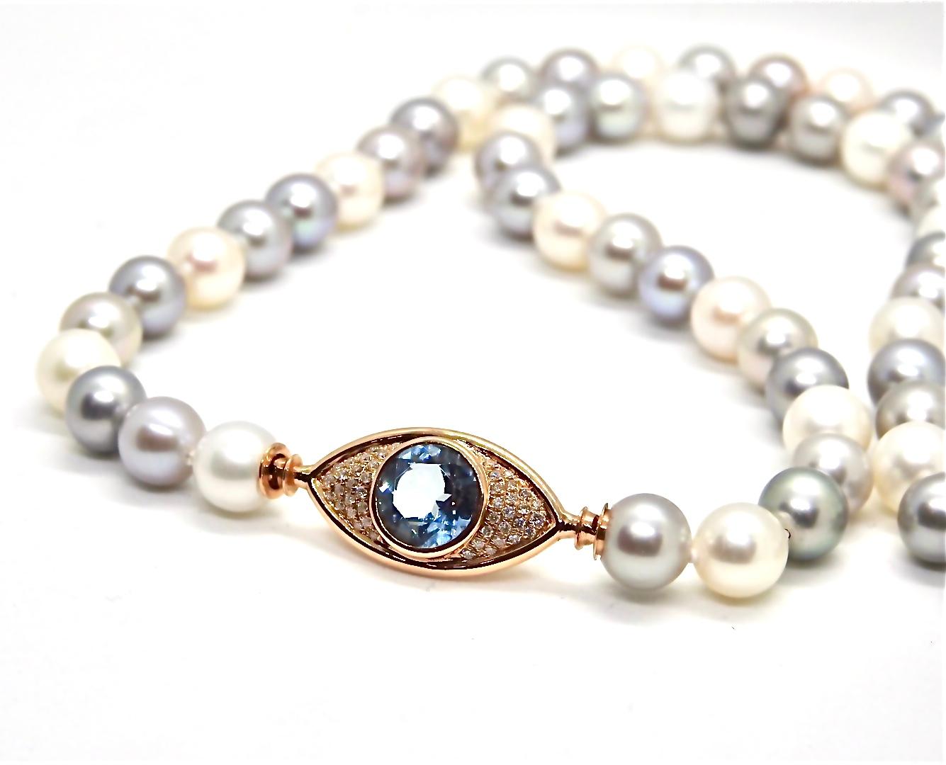 Round Cut Pearls Necklace with 18 Karat Gold, Diamonds and Swiss Blue Topaz Eye Clasp For Sale