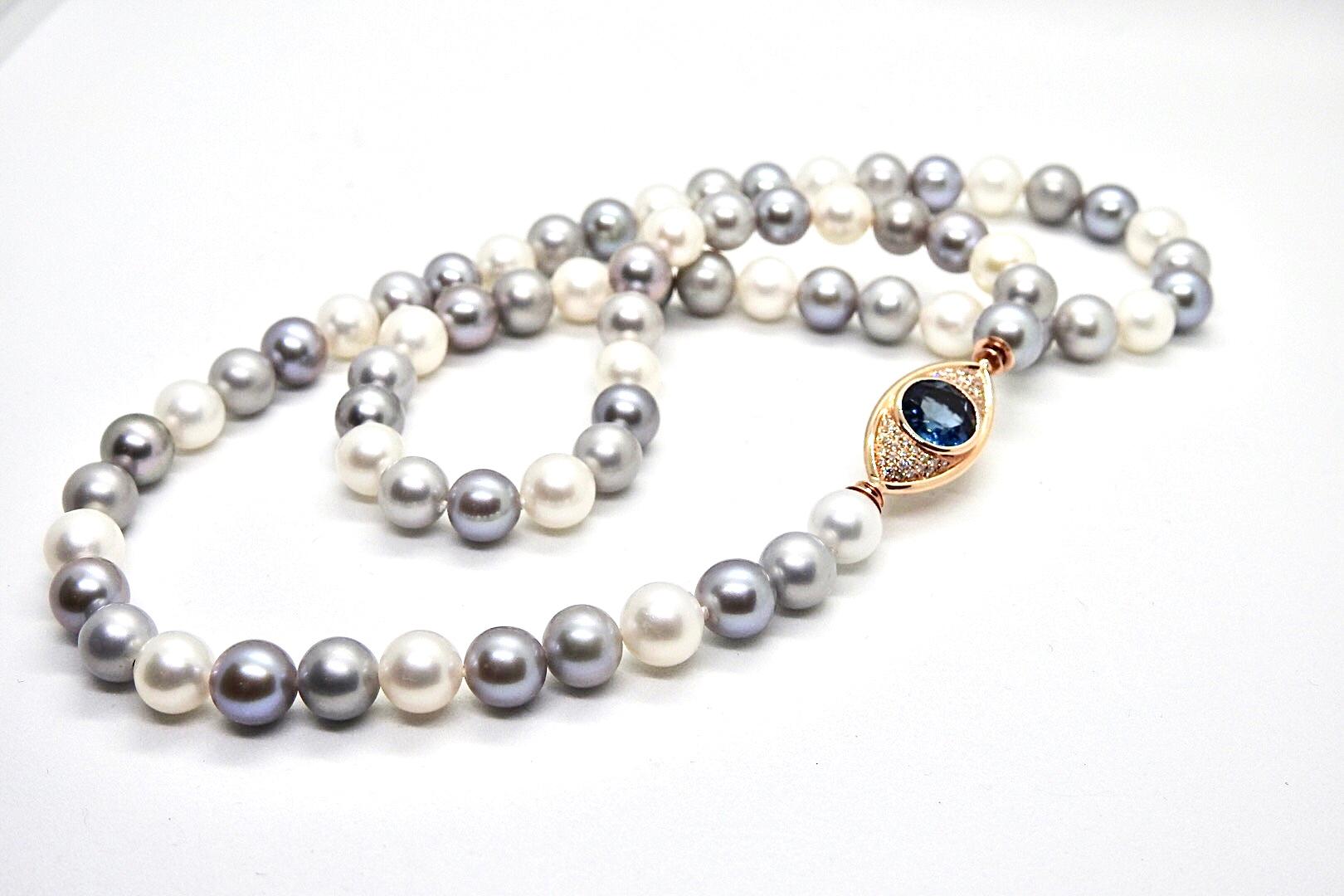 Pearls Necklace with 18 Karat Gold, Diamonds and Swiss Blue Topaz Eye Clasp For Sale 1