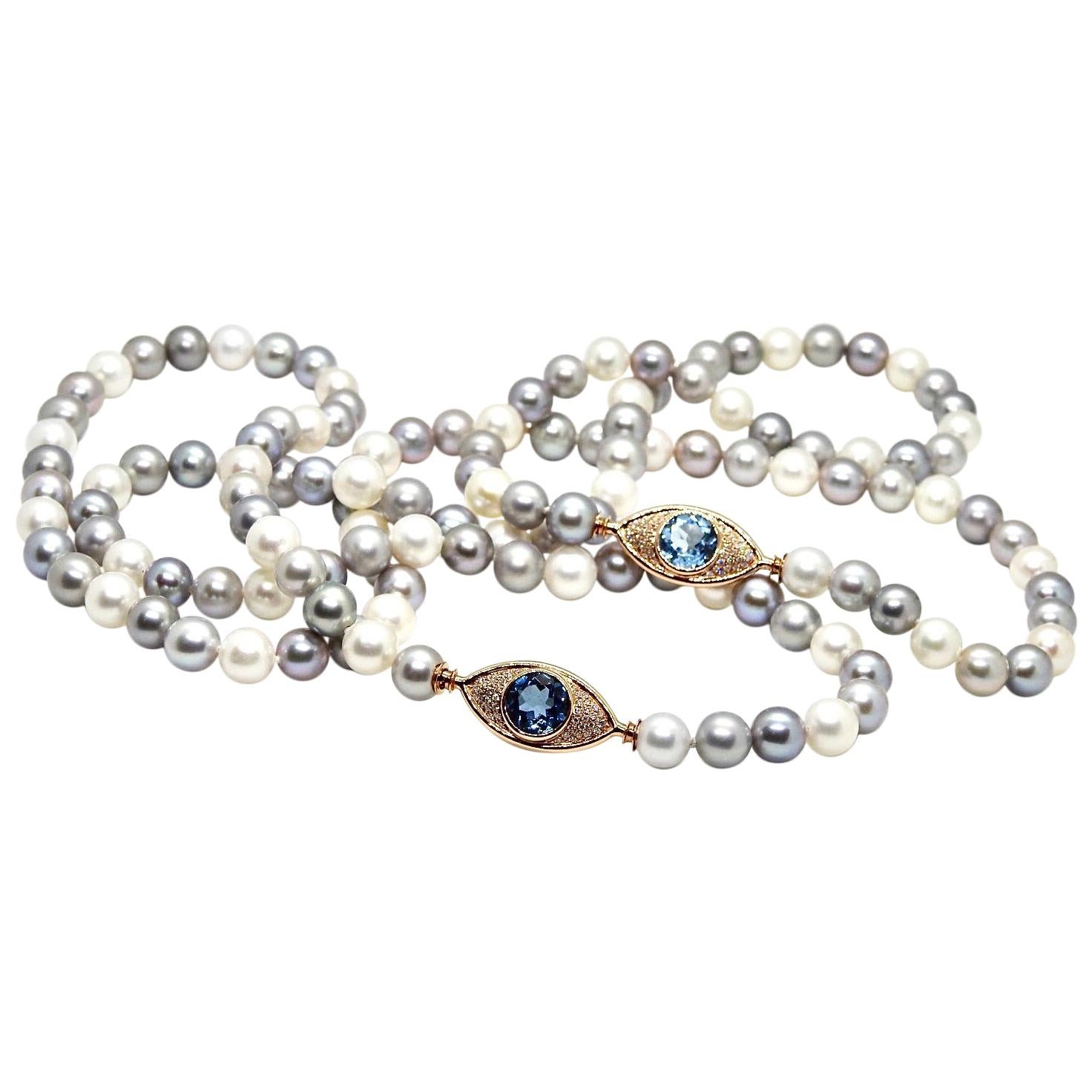 Pearls Necklace with 18 Karat Gold, Diamonds and Swiss Blue Topaz Eye Clasp For Sale