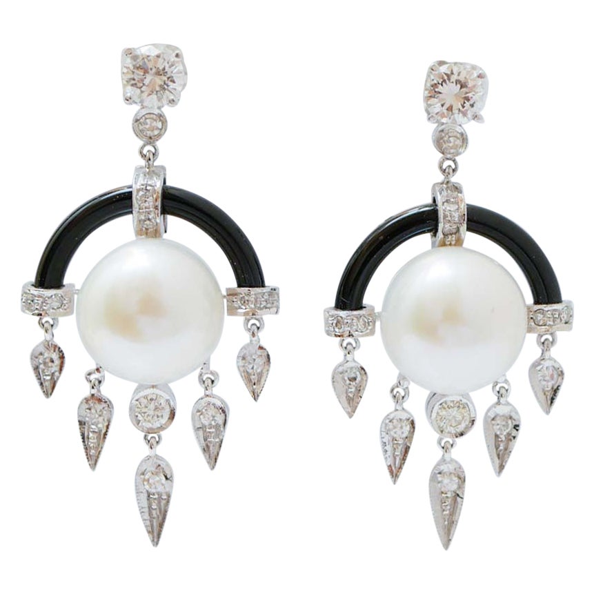Pearls, Onyx, Diamonds, Platinum Earrings.