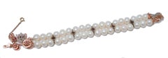 Pearls, Rubies, Diamonds, Rose Gold and Silver Carriage Bracelet