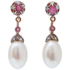 Boucles d'oreilles en or rose, perles, rubis et diamants