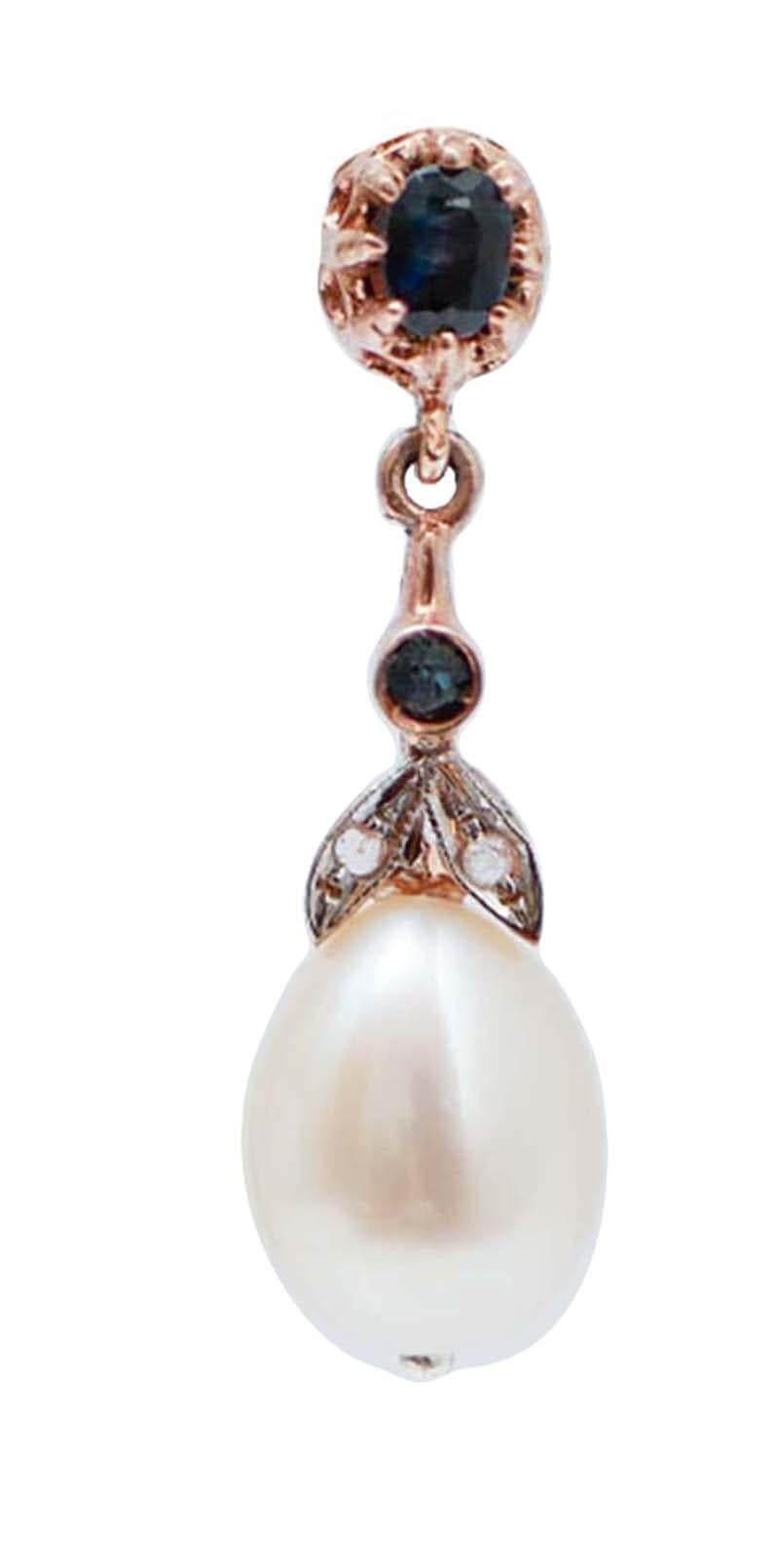 Bellissimi orecchini in oro rosa 9 kt e struttura in argento montata con zaffiri per tutta la lunghezza e due foglie tempestate di diamanti; nella parte finale, una perla.
Questi orecchini sono stati realizzati totalmente a mano da maestri orafi