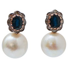 Boucles d'oreilles en perles, saphirs, diamants, or rose et argent.