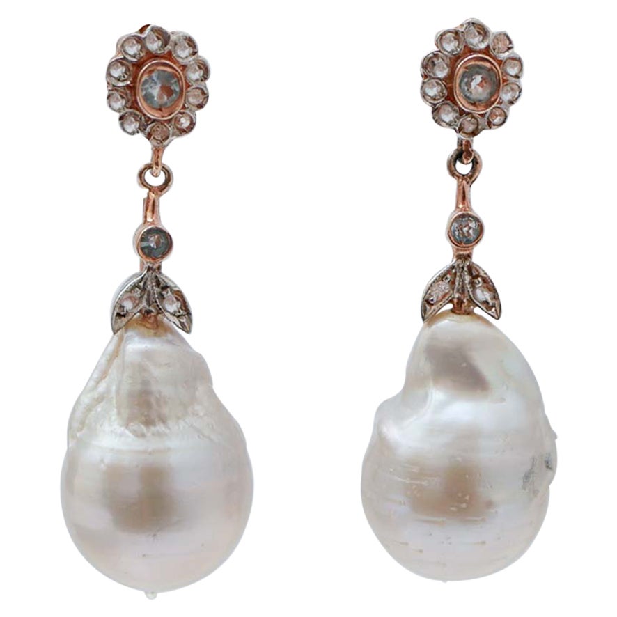 Pendientes de perlas, topacio, diamantes, oro rosa y plata.