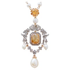 Collana con perle, topazio, diamanti, oro rosa e argento.