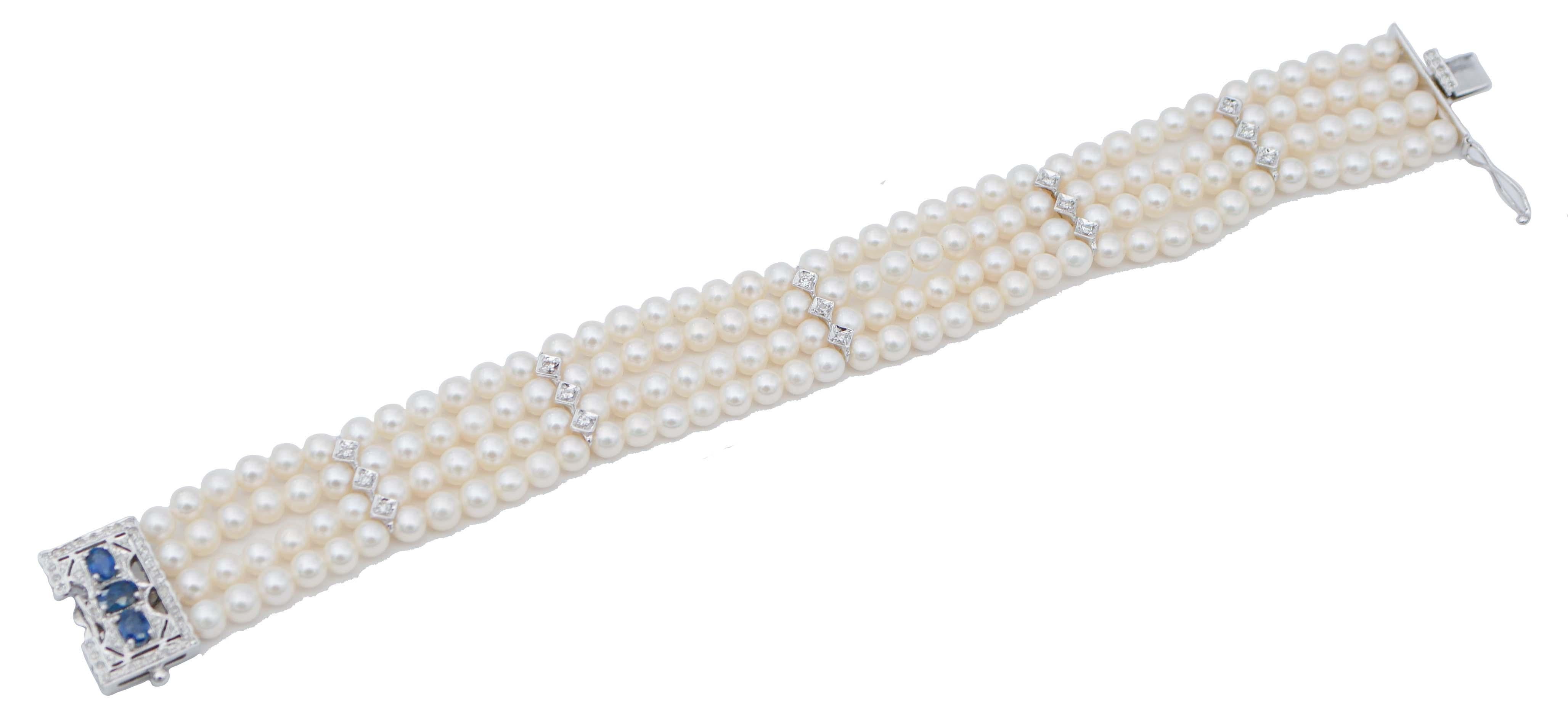 SHIPPING POLICY: 
No additional costs will be added to this order. 
Shipping costs will be totally covered by the seller (customs duties included).

Amazing beaded retrò bracelet composed of 4 strands of pearls and a clasp in 14 kt white gold