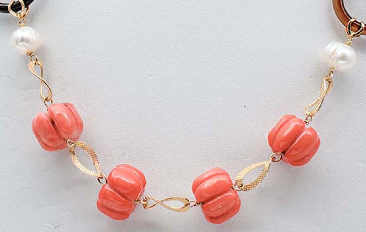 SHIPPING POLICY:
No additional costs will be added to this order.
Shipping costs will be totally covered by the seller (customs duties included).

Gorgeous retrò necklace in silver structure mounted with pearls, bamboo coral and stones.
Total Weight