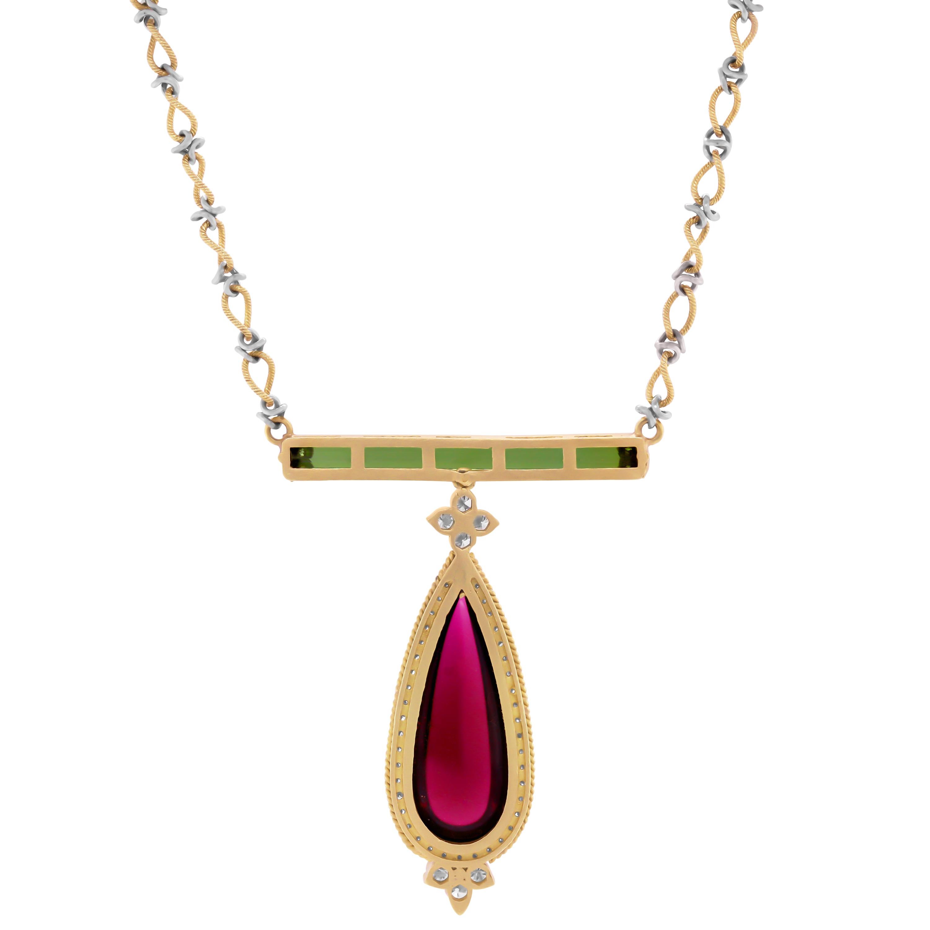 18K Yellow and White Gold Necklace with a Cabochon, Pearshape, Rubelite and Green Tourmaline Pendant by Stambolian

3.59 carat Rectangular Green Tourmaline
13.40 carat Cabochon, Pearshape Rubelite

1.05 carat G color, VS clarity diamonds

Pendant is