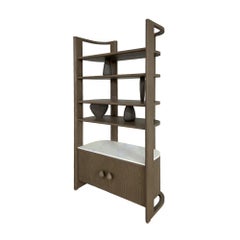 Meuble à étagères en galets Par André Fu Living