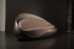 Nature Inspired Sculptural Fiberglass Sofa with Plush Cushions