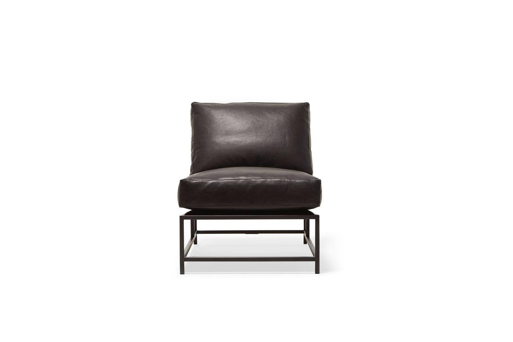Sleek and refined, the Inheritance Collection Chair by Stephen Kenn is a great addition to nearly any space. 

This chair is upholstered in a rich black leather from the Moore & Giles Harness collection. The foam seat cushion has been wrapped in