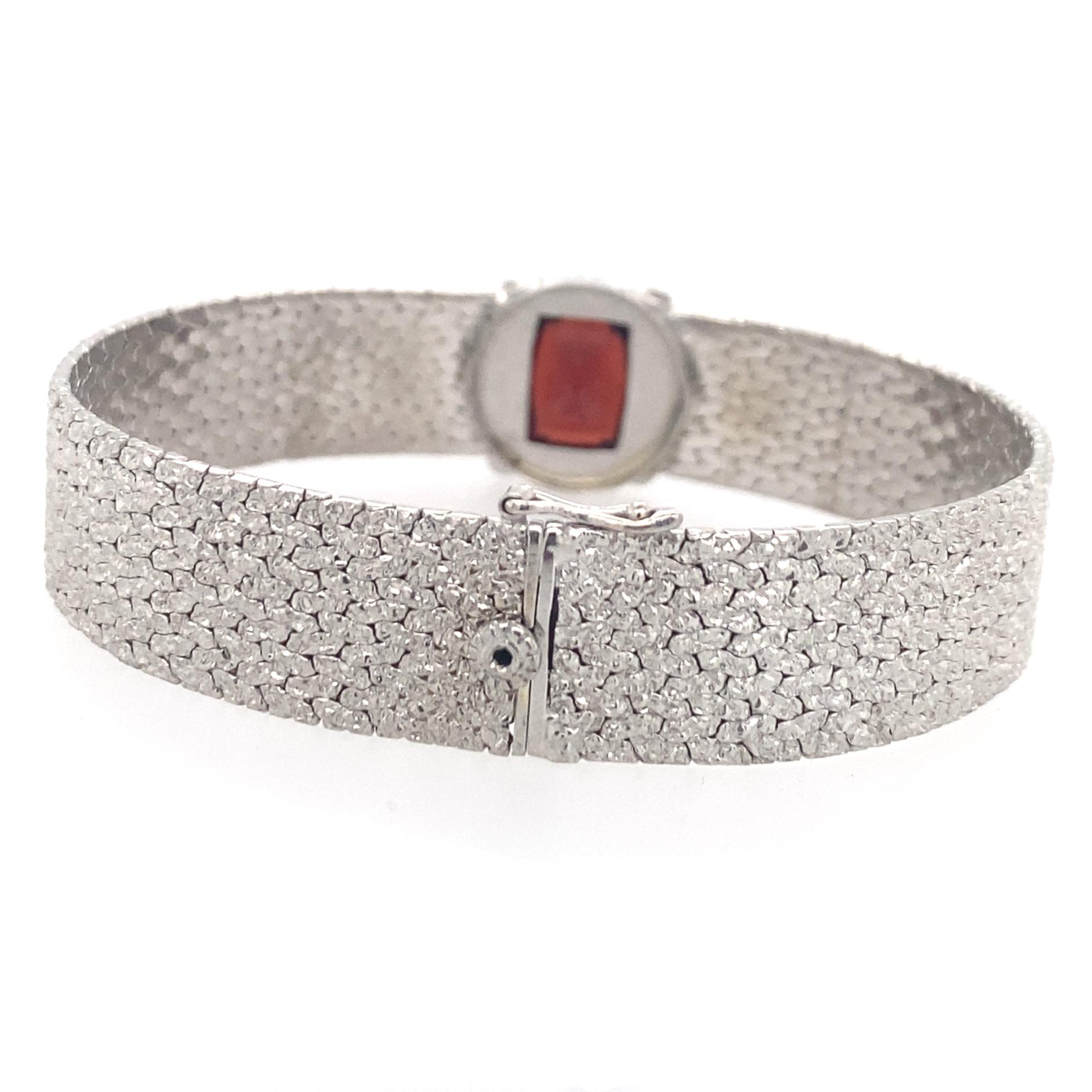 Pebbled White Gold Bangle Bracelet with Garnet in Diamond Halo In Excellent Condition In Sherman Oaks, CA