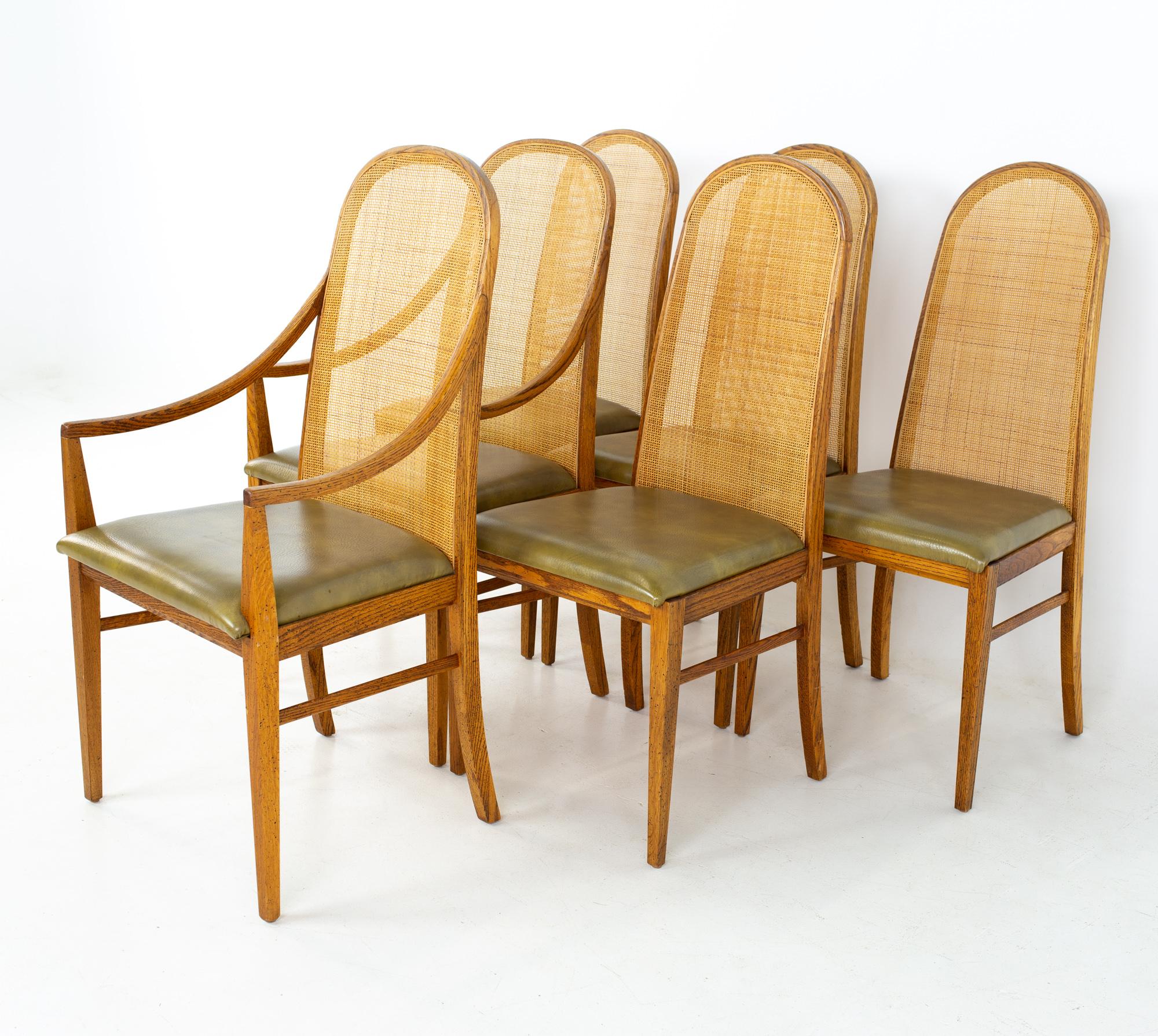 Dillingham Style Mid Century oak and cane dining chairs, set of 6
Each chair measures: 20.75 wide x 18 deep x 41 high, with a seat height of 19 inches

All pieces of furniture can be had in what we call restored vintage condition. That means the