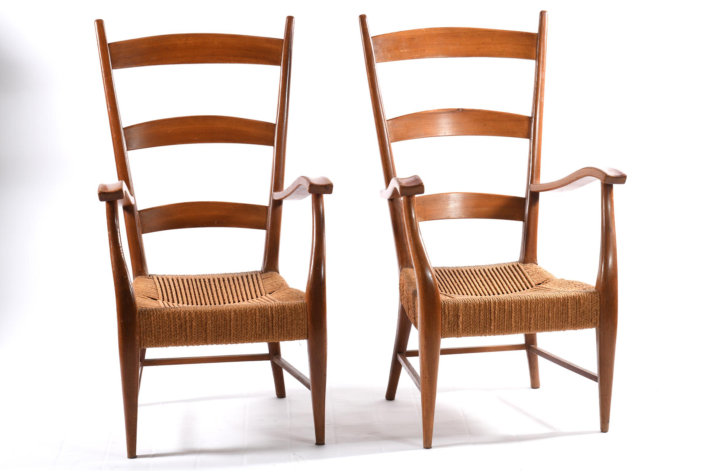Pair of armchairs made with a high back with horizontal slats and armrests shaped in sculpted solid wood. Designed and executed by Gugliemo Pecorini Florence Italy in the early 1940s of the 20th century, they present a handcrafted seat in woven