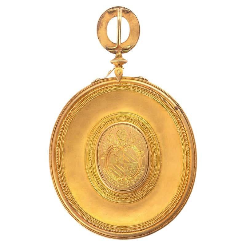 PECTORAL-GOLDANHÄNGER VON CASTELLANI MIT EINER KAMERA, DIE Luigi Pichler 1773 - 1854 MIT DEM EFFEGIUM VON PAPST PIO IX. zugeschrieben wird

Pendente in oro inciso e in filigrana attribuito a Castellani, con al centro un cammeo in agata raffigurante