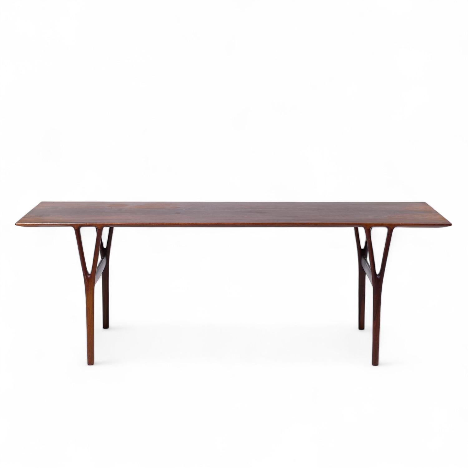 Peder Pedersen Dk for Helge Vestergaard Jensen Mid Century Danish Rosewood Coffee Table

This coffee table measures: 59 wide x 19.75 deep x 20 inches high

All pieces of furniture can be had in what we call restored vintage condition. That means the