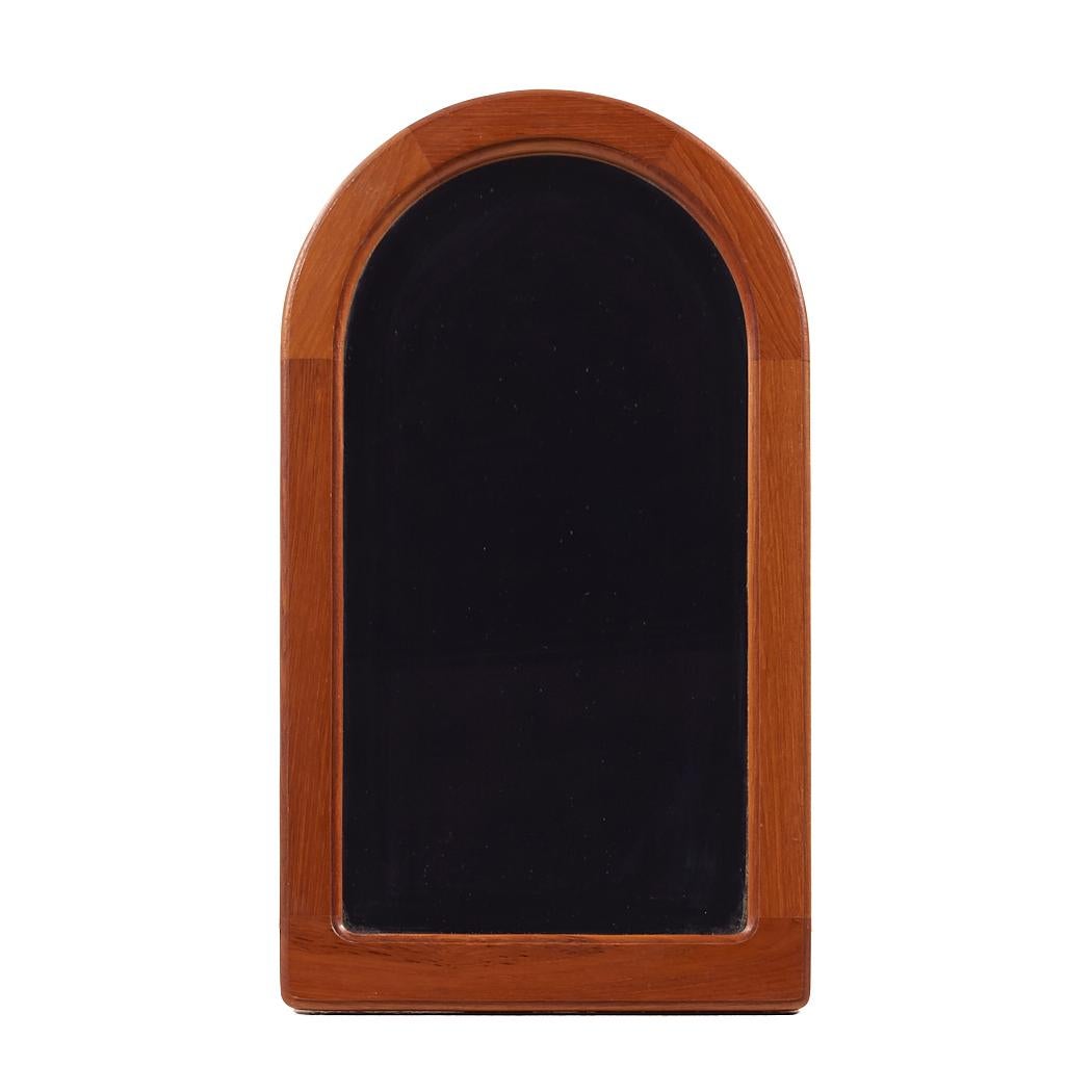 Pedersen and Hansen Mid Century Danish Teak Mirror

This mirror measures: 13.75 wide x .75 deep x 24.25 inches high

All pieces of furniture can be had in what we call restored vintage condition. That means the piece is restored upon purchase so