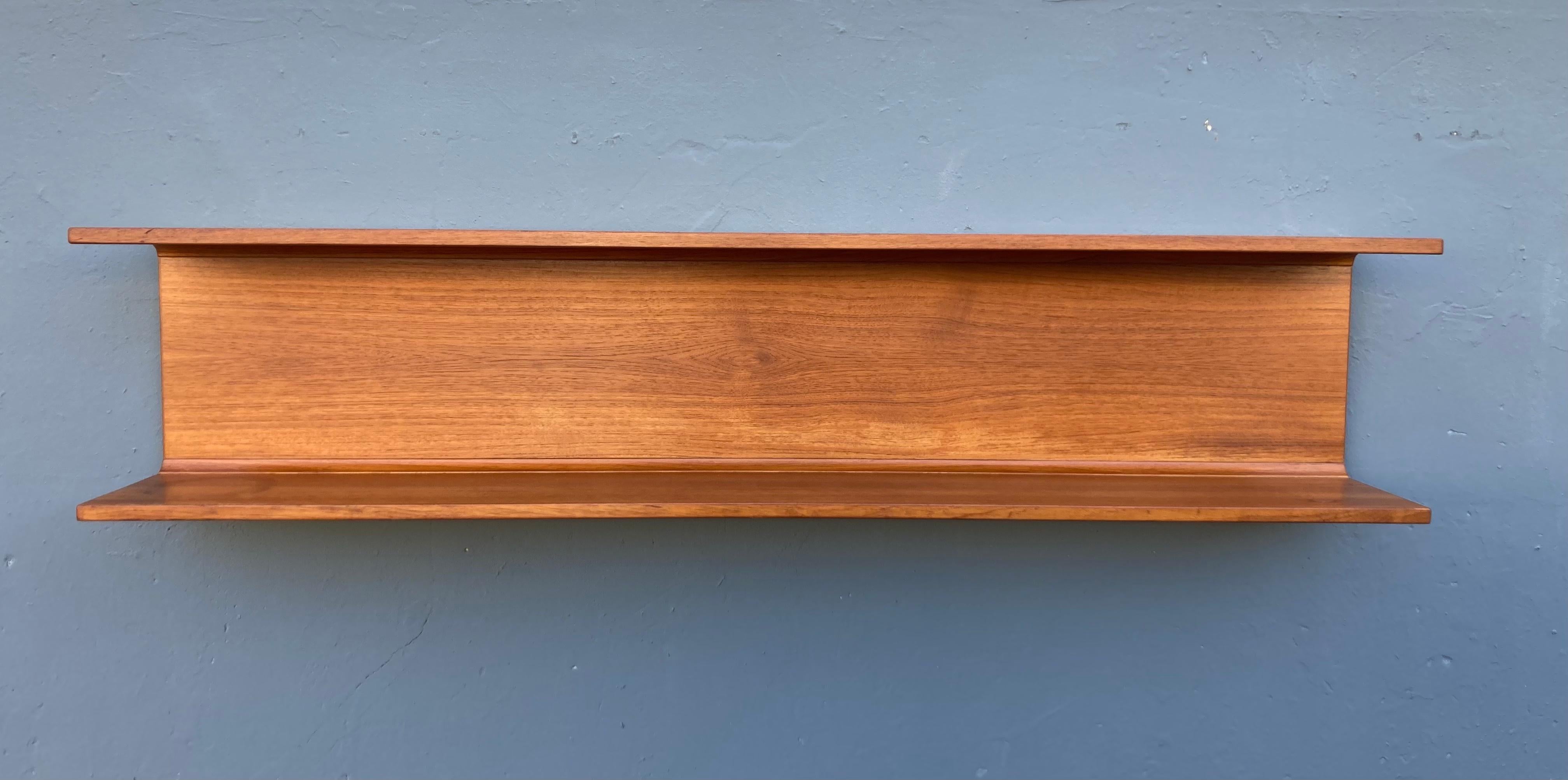Large Pedersen & Hansen teak wall shelf. Storage depth is 7.25”.
Ready for a new home.