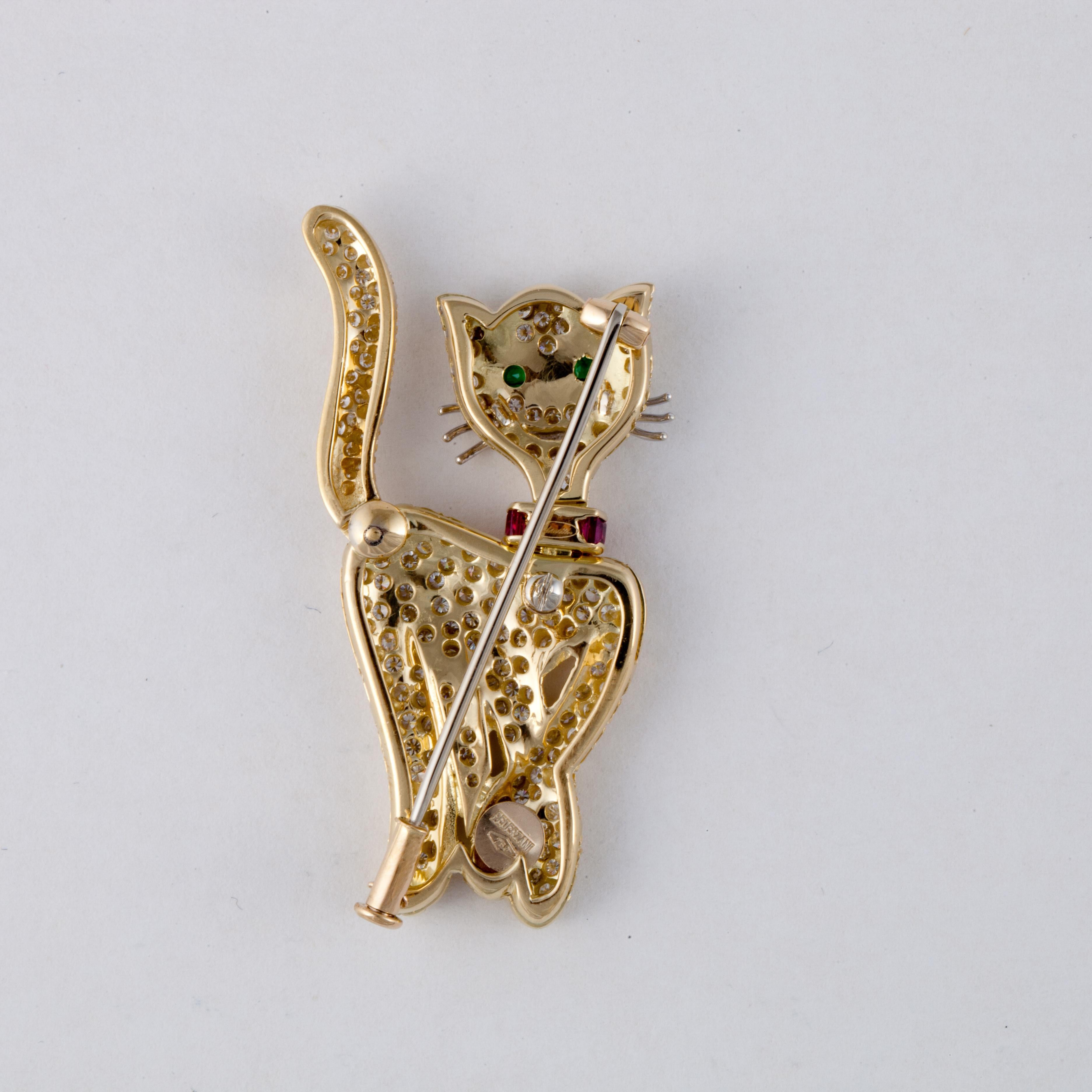Pederzani cat pin composed of 18K yellow gold with diamonds, rubies and emeralds.  Signed 