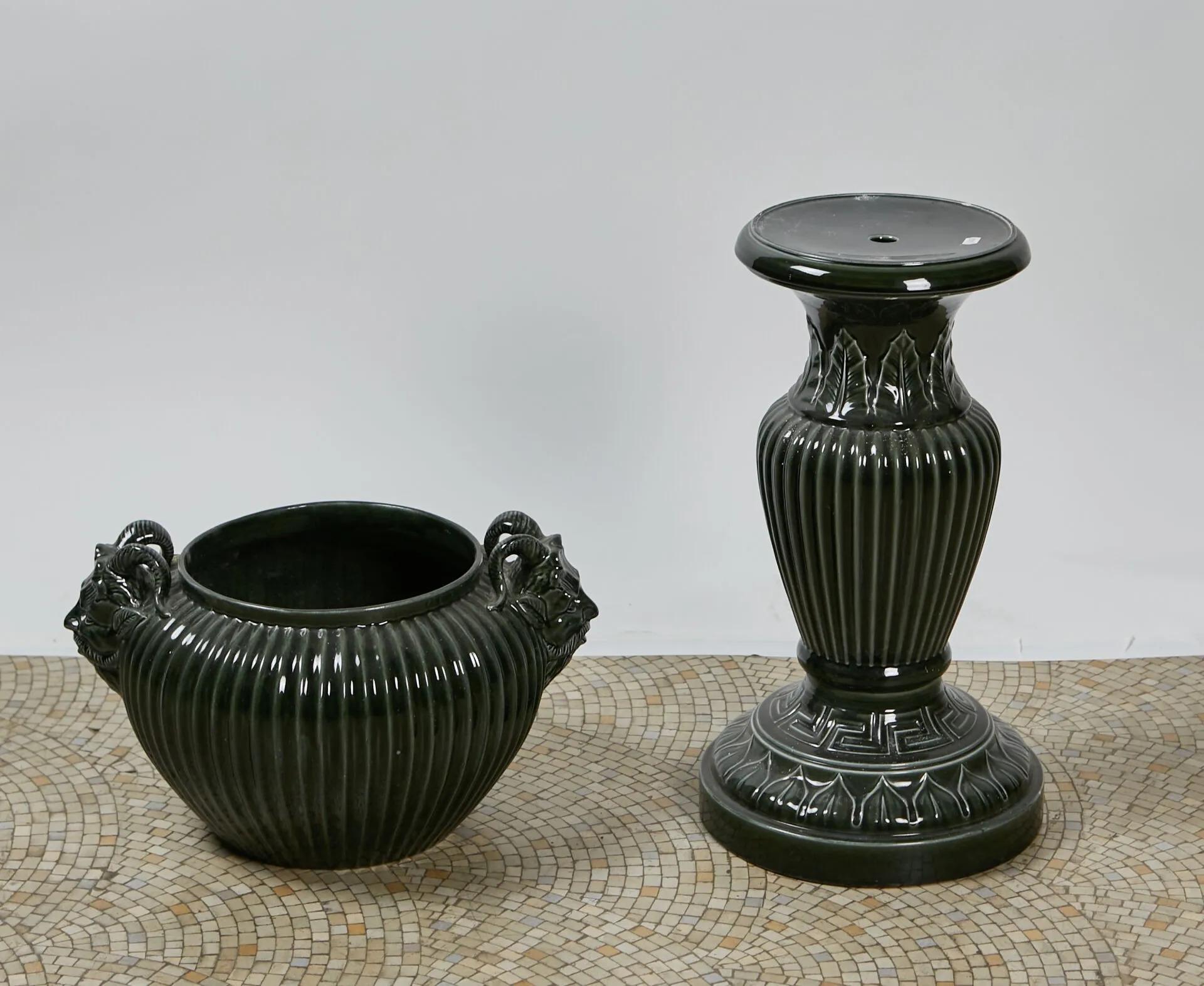 ribbed ceramic pot holder and pedestal,
decoration of head of fauns, circa 1900